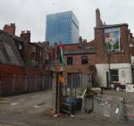 Gary Neville houses squatted in Manchester
